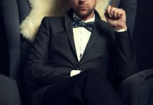 https://unsplash.com/photos/a-man-in-a-tuxedo-smoking-a-cigarette-b0JAsupO_I0